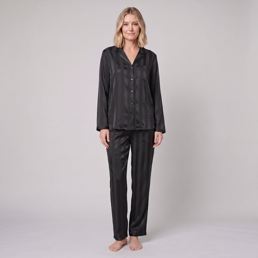 Luxe satin pajama set in black, front view on model