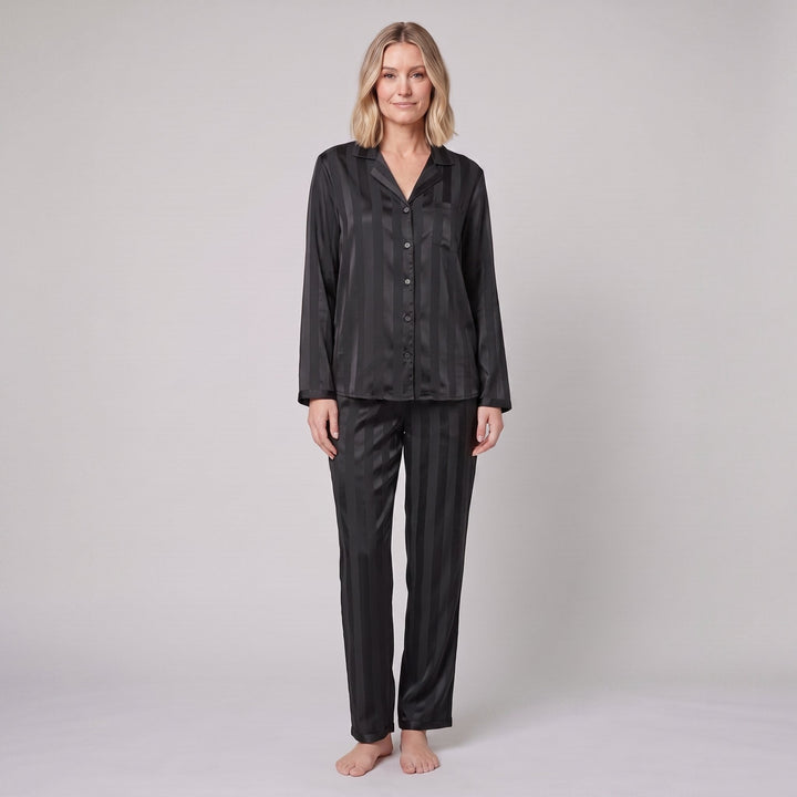 Luxe satin pajama set in black, front view on model