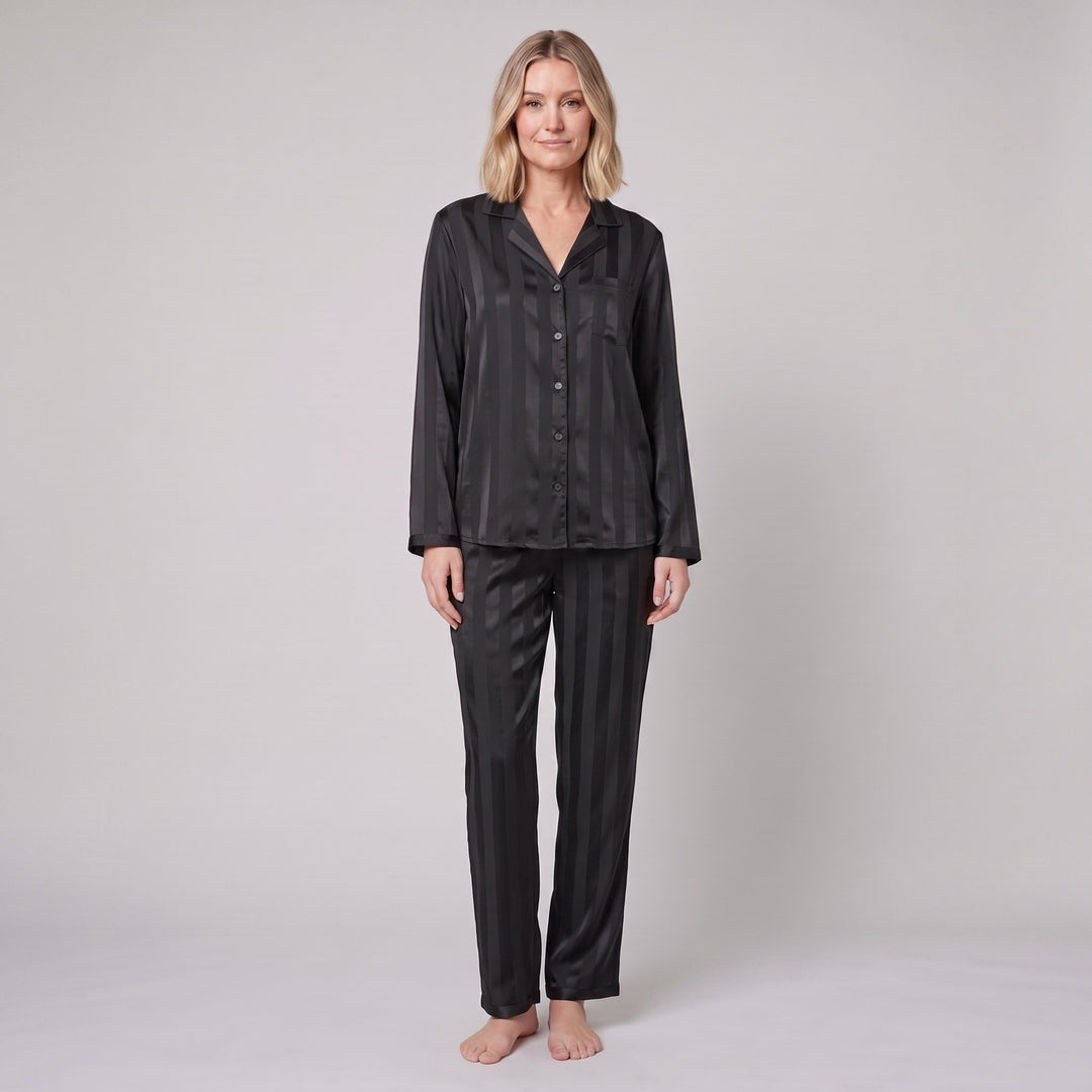 Luxe satin pyjama set in black, front view on model