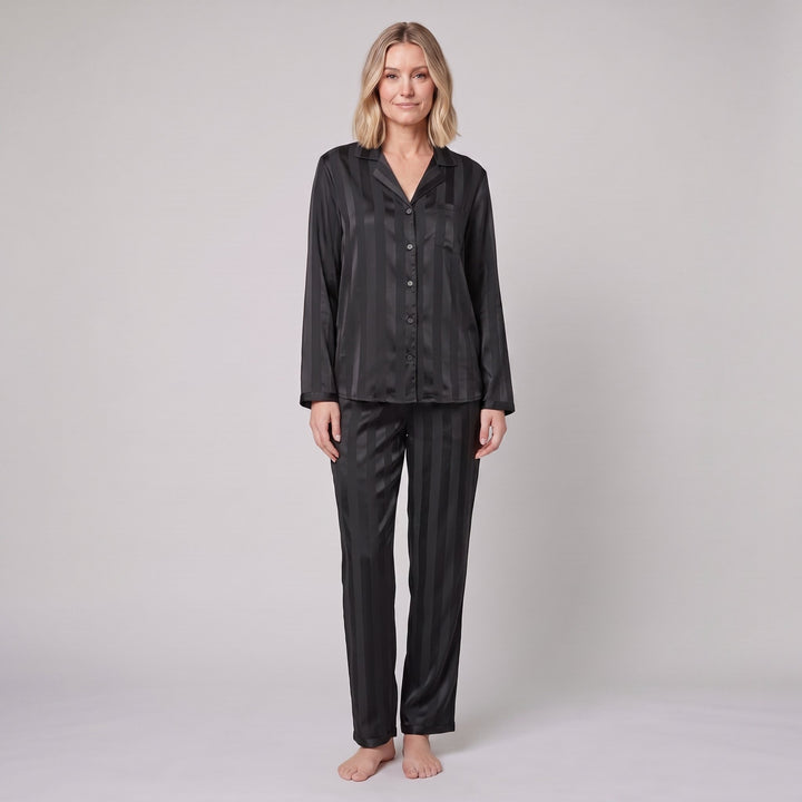 Luxe satin pyjama set in black, front view on model