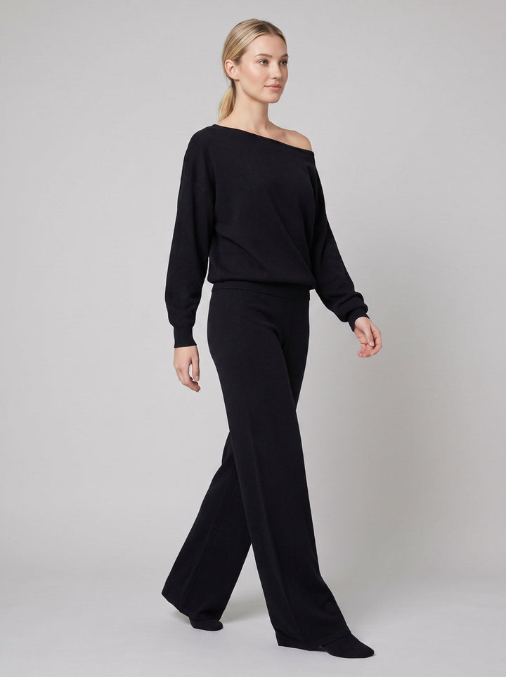 Maelle off-shoulder knit lounge set in black, sweater and wide-leg pants on model