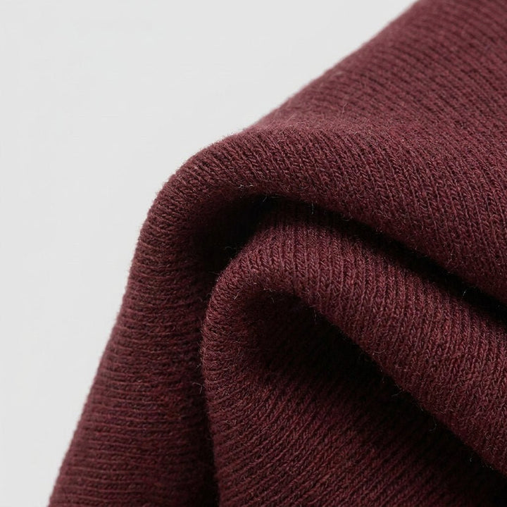 Close-up of the rayon and elastane fabric and the pleated collar