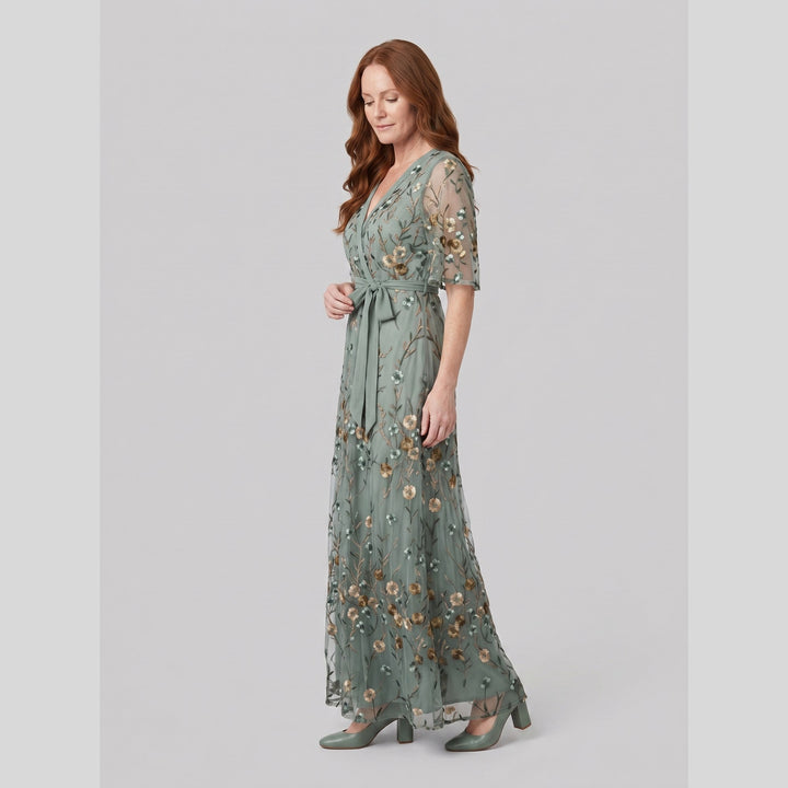 Sage green floral embroidered evening gown, side view