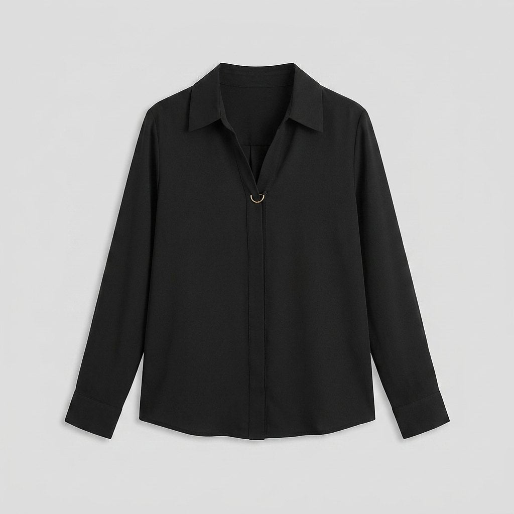 Button-front blouse laid flat, full garment