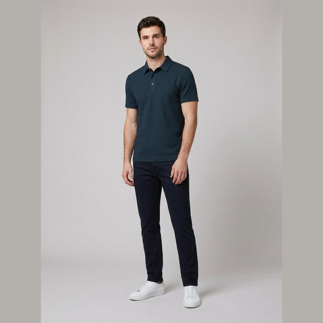 Blue short-sleeved golf polo shirt, front view on model