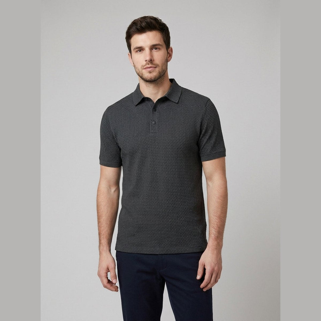 Grey short-sleeved golf polo shirt, front view on model