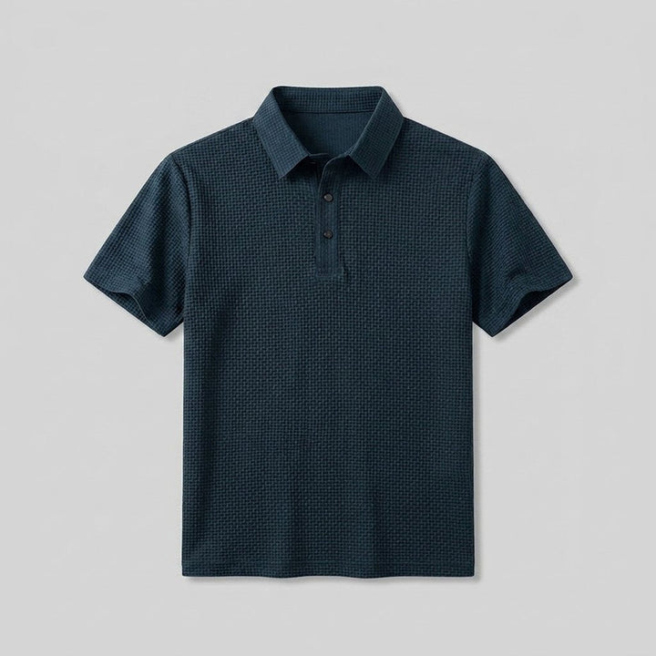 Golf polo shirt laid flat, showing the button placket and collar