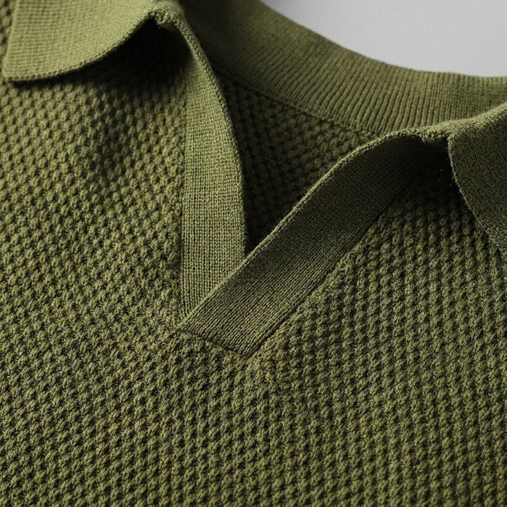 Milo polo shirt knit texture and V-neck collar close-up