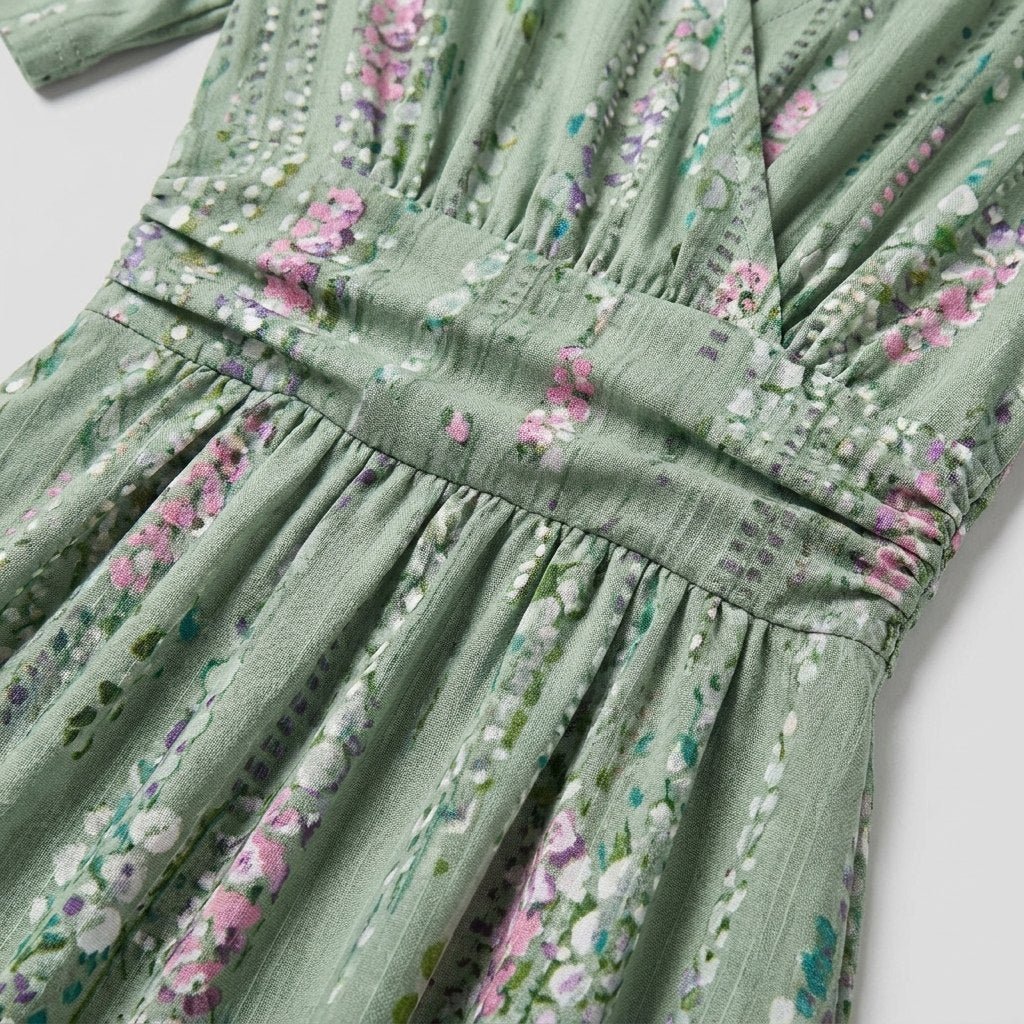 Mira floral V-neck midi dress fabric detail