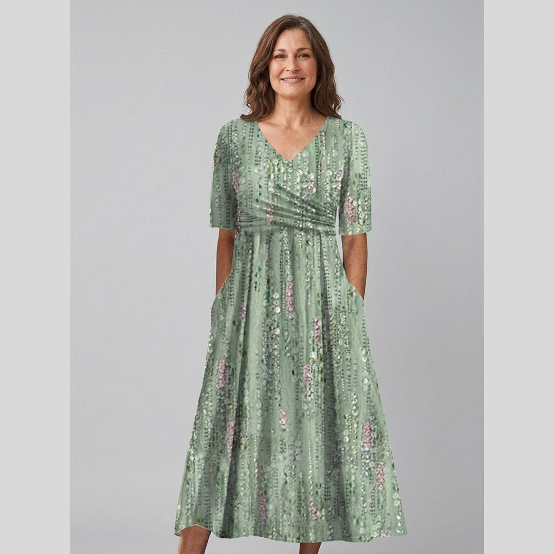 Mira floral V-neck midi dress green on model front