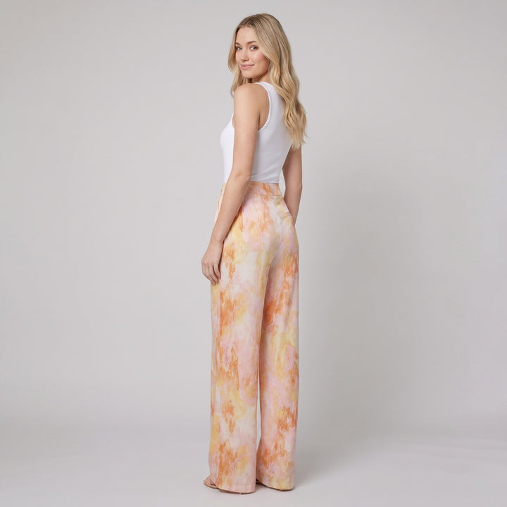 Mira marble print high waisted pants orange on model