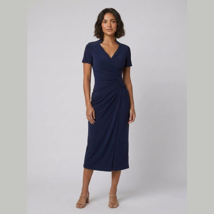 Moya navy ruched wrap midi dress on model second pose