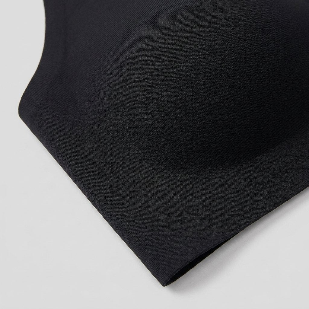 Close-up of the seamless fabric and plunge neckline
