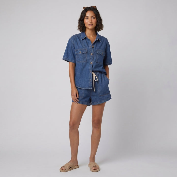 Olivia denim shirt and shorts set in blue on female model