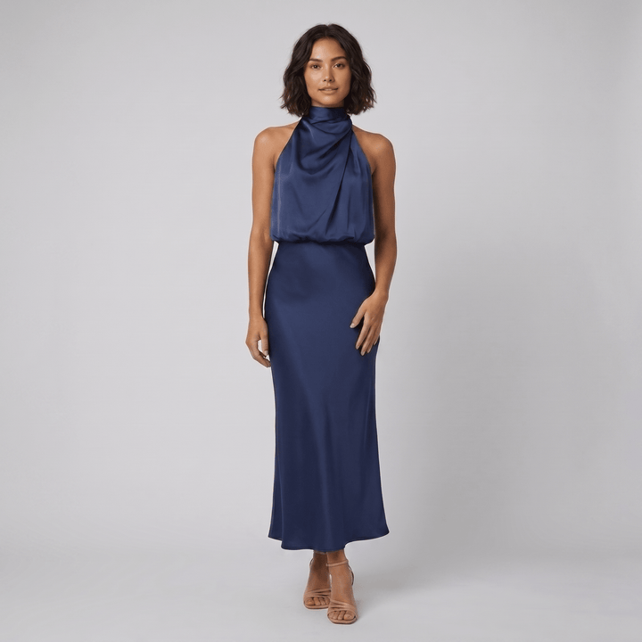Ombline floor-length satin halter gown in navy blue, on model