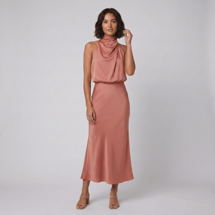 Ombline floor-length satin halter gown in salmon, on model