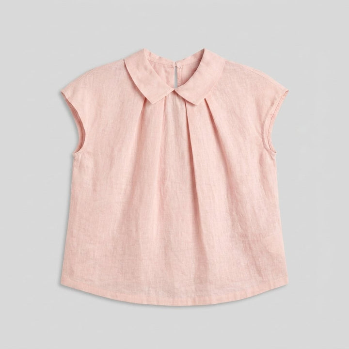 Pale blush linen pintuck top, front flat-lay