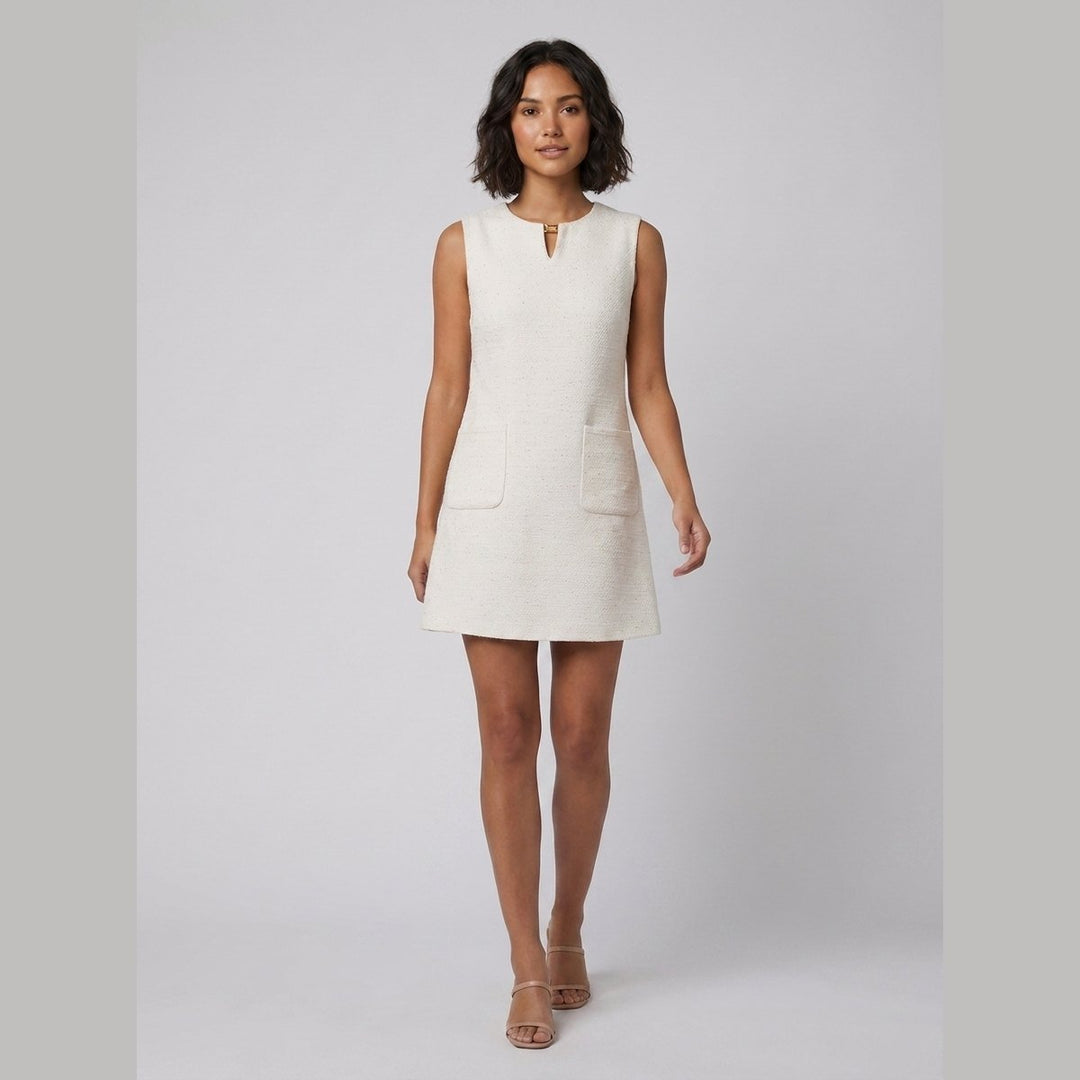 Orla white textured A-line mini dress walking on model