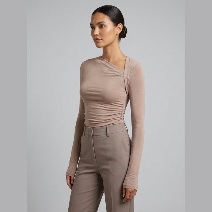 Apricot asymmetric-neck shirt, slim fit, front view on model