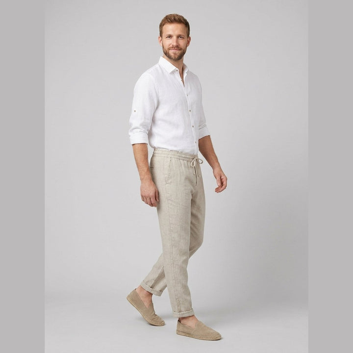 Palo men's natural linen tapered drawstring pants side view on model