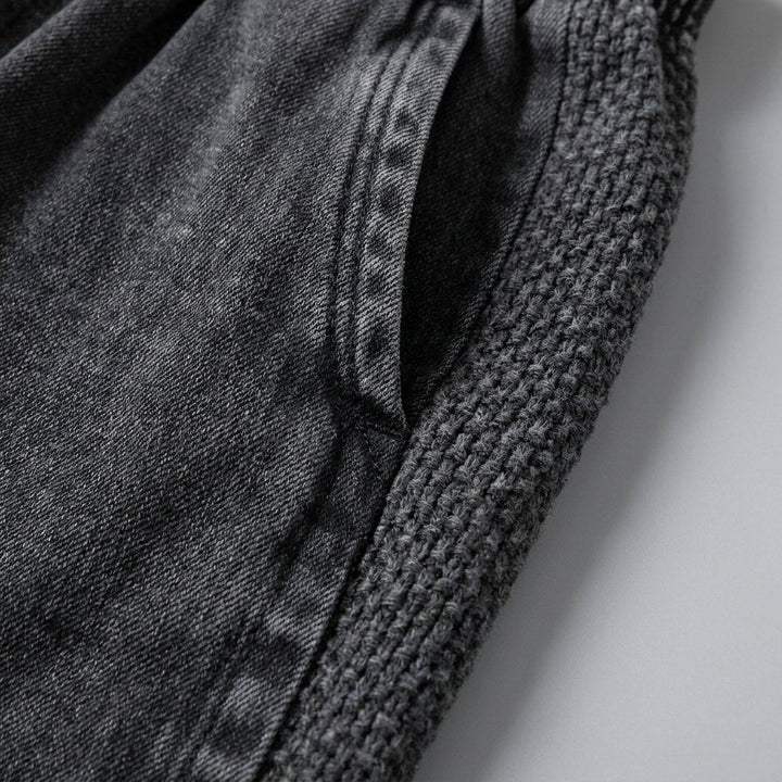 Close-up of the denim and patchwork panels on the Palo pants