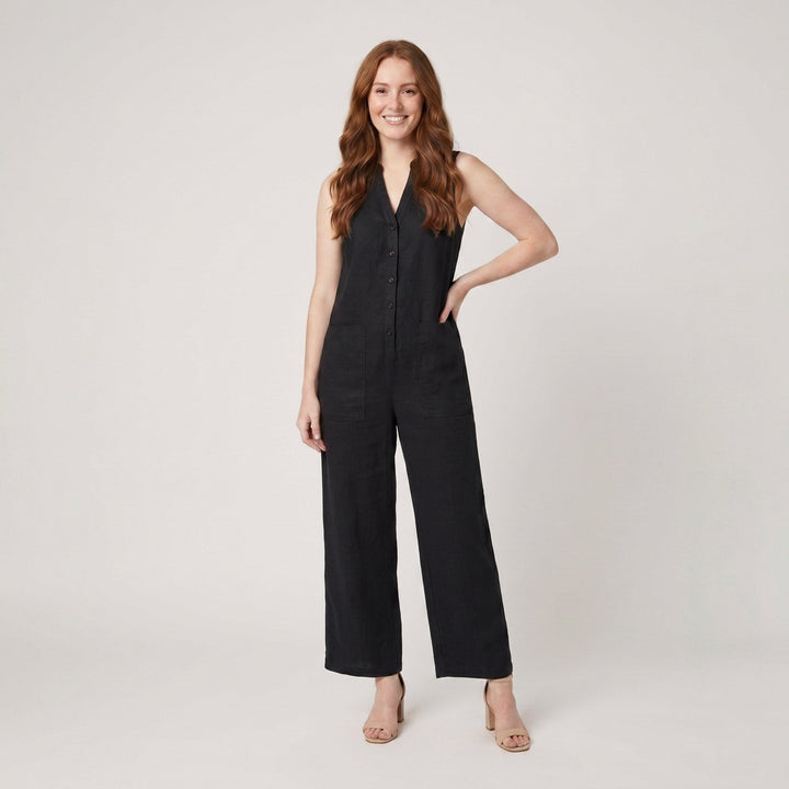 Black sleeveless linen-blend jumpsuit with a button front, on model