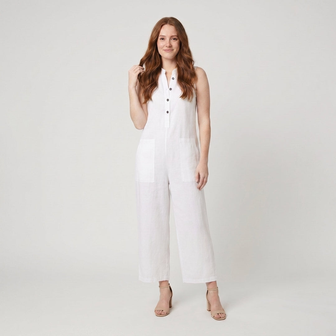 White sleeveless linen-blend jumpsuit with a button front, on model