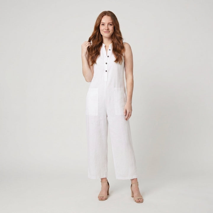 White sleeveless linen-blend jumpsuit with a button front, on model
