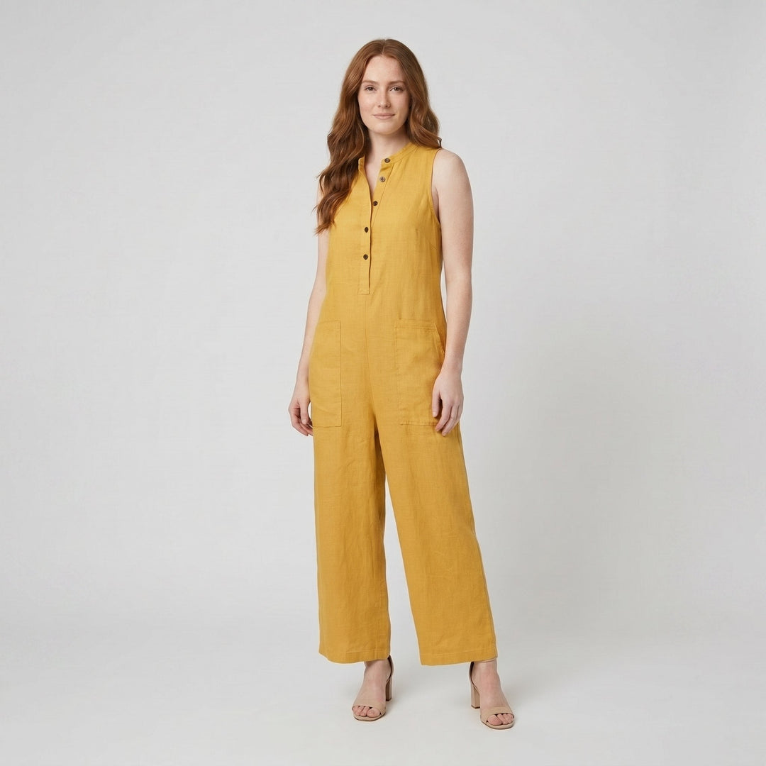 Yellow sleeveless linen-blend jumpsuit with a button front, on model