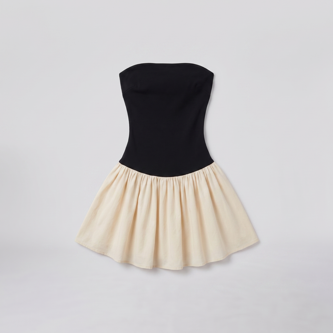 Pave backless jersey cocktail dress in black and cream, flat lay product shot
