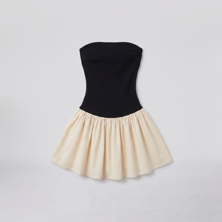 Pave backless jersey cocktail dress in black and cream, flat lay product shot