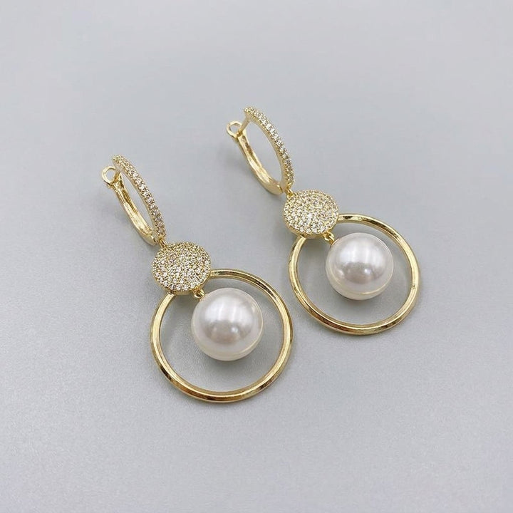 Pearluxe pearl earrings angled view
