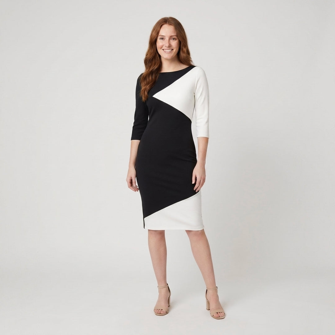 Philippa black and white colourblock midi dress front on model