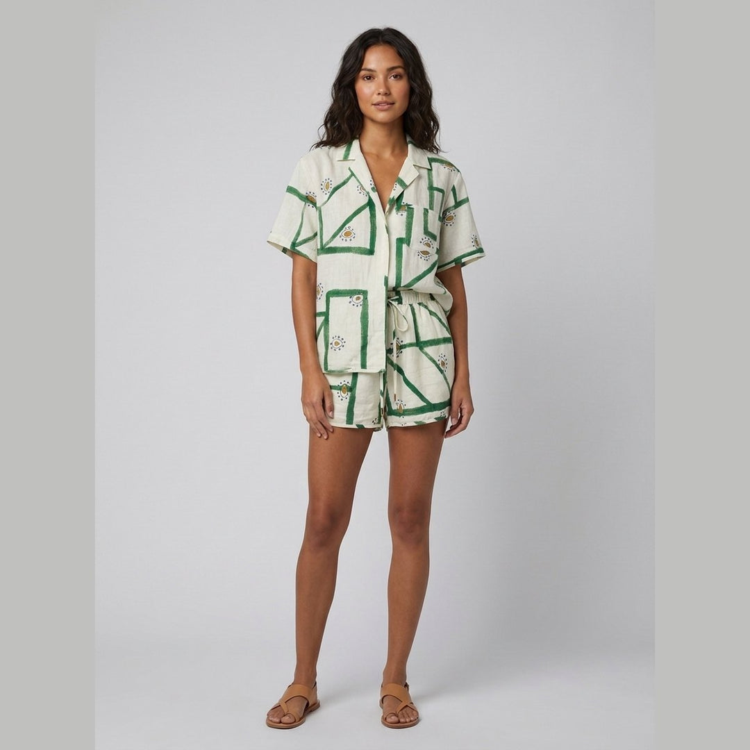 Pine off-white linen shorts set green print front on model
