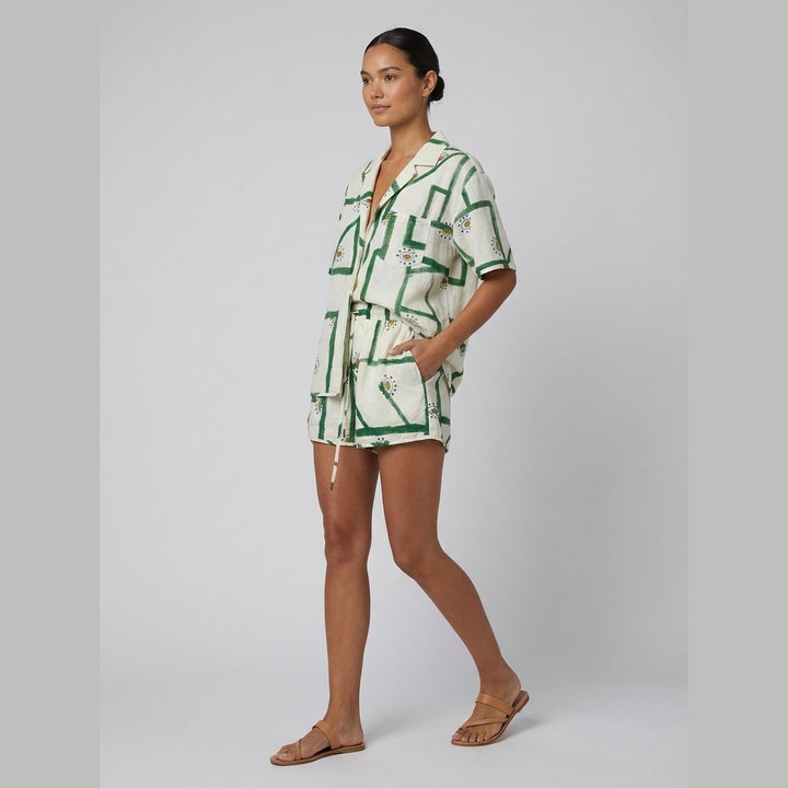 Pine off-white linen shorts set side view on model
