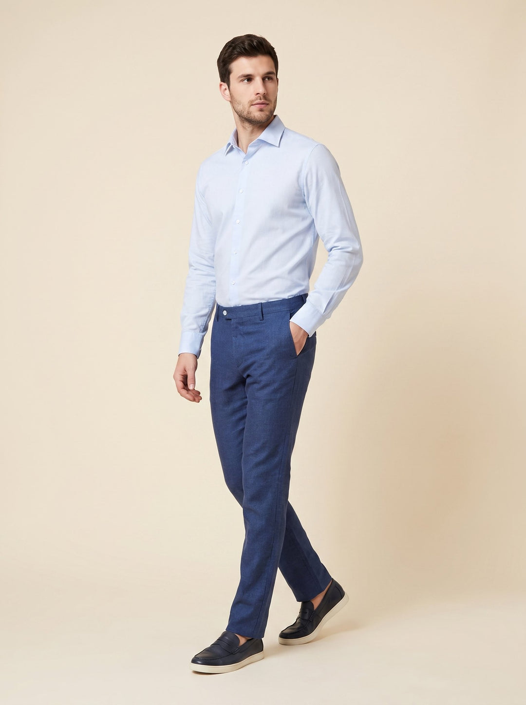Plyer linen trousers indigo blue walking pose