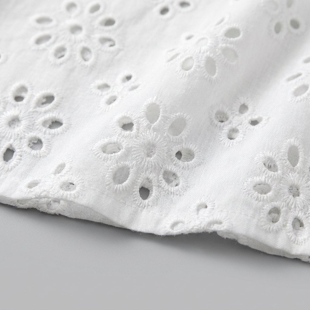 Pride flutter dress eyelet fabric detail