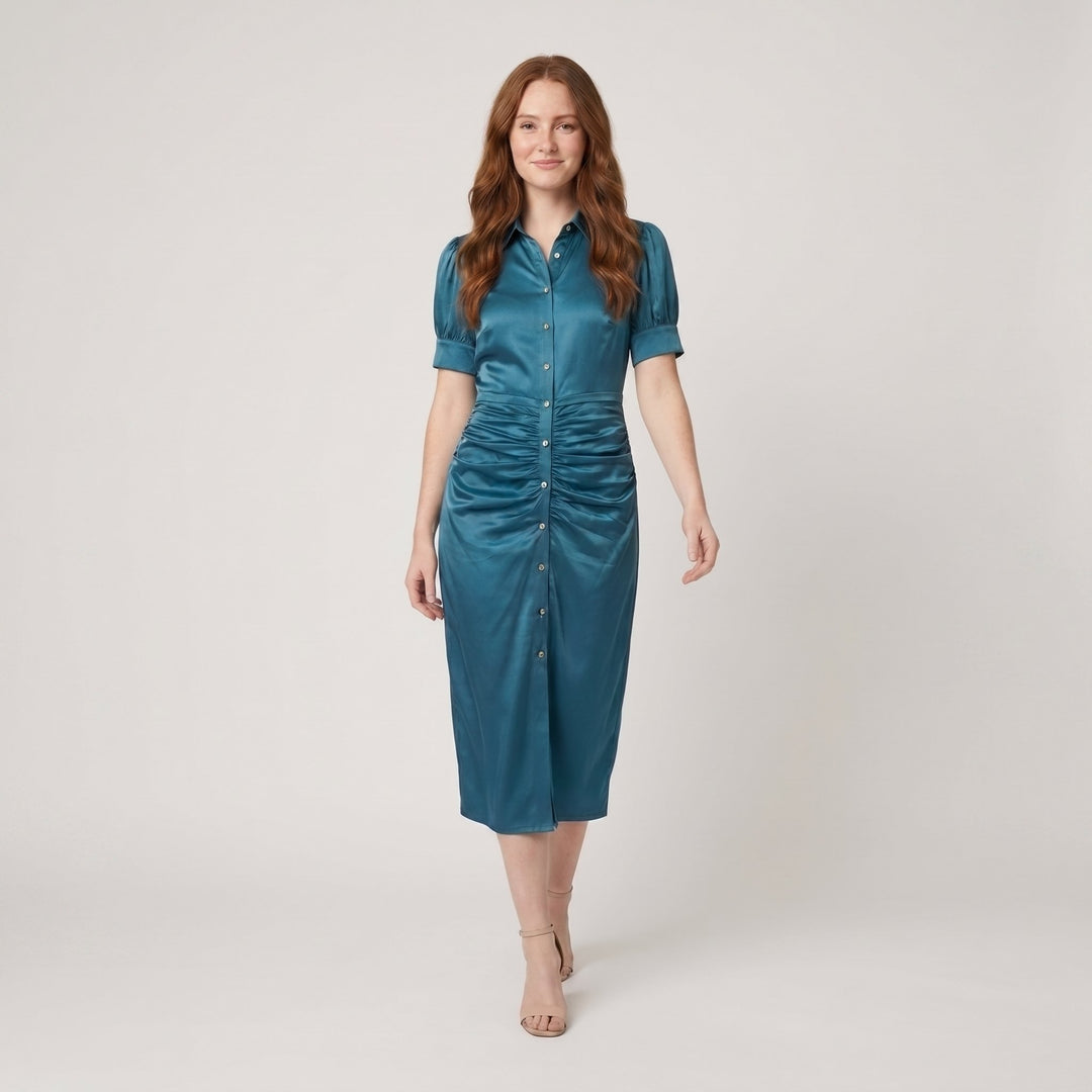 Ravine teal satin ruched midi dress on model walking pose
