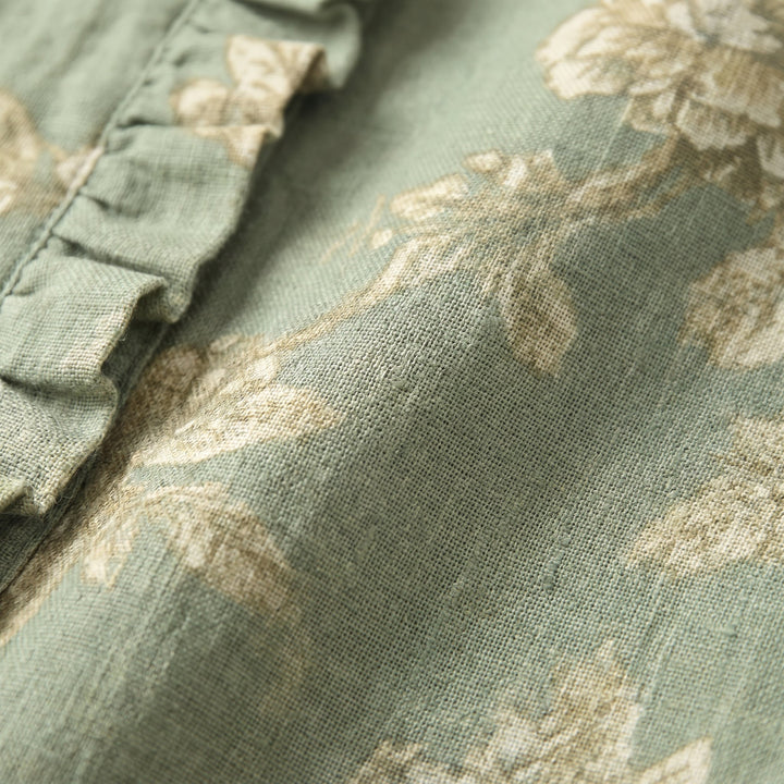 Rosalinde sage-green linen fabric close-up