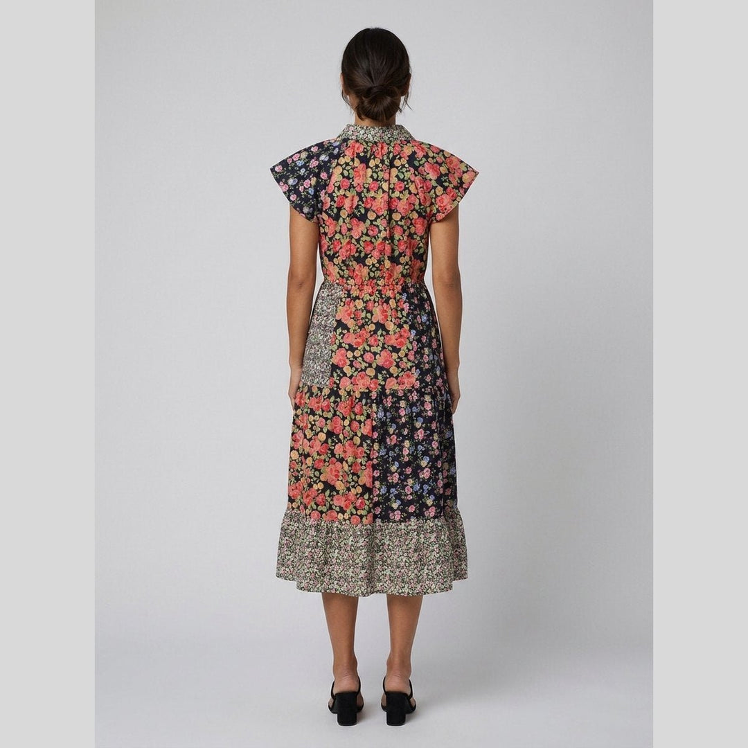 Sabrine cotton midi dress in a mixed floral print, back view on model