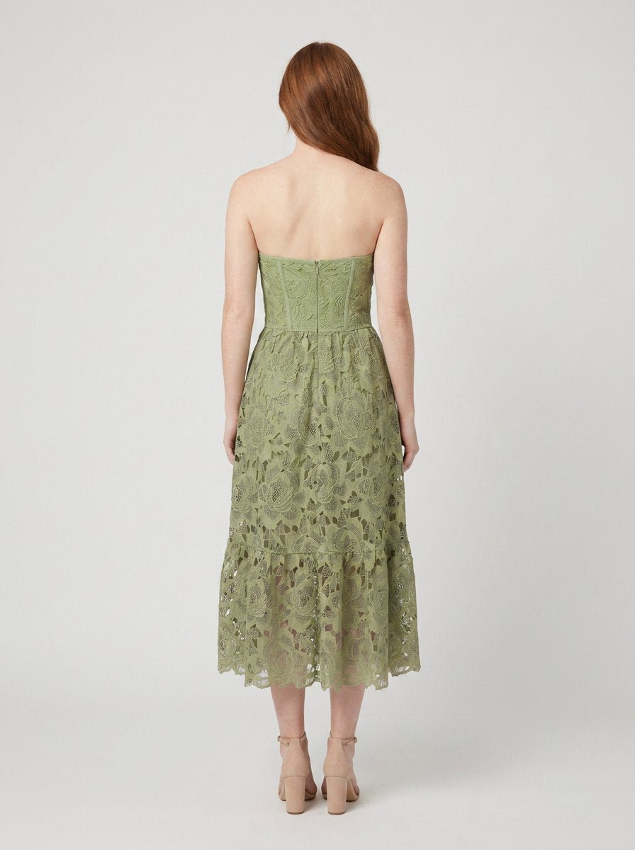 Salome floral midi dress in green, back view showing the rear zip