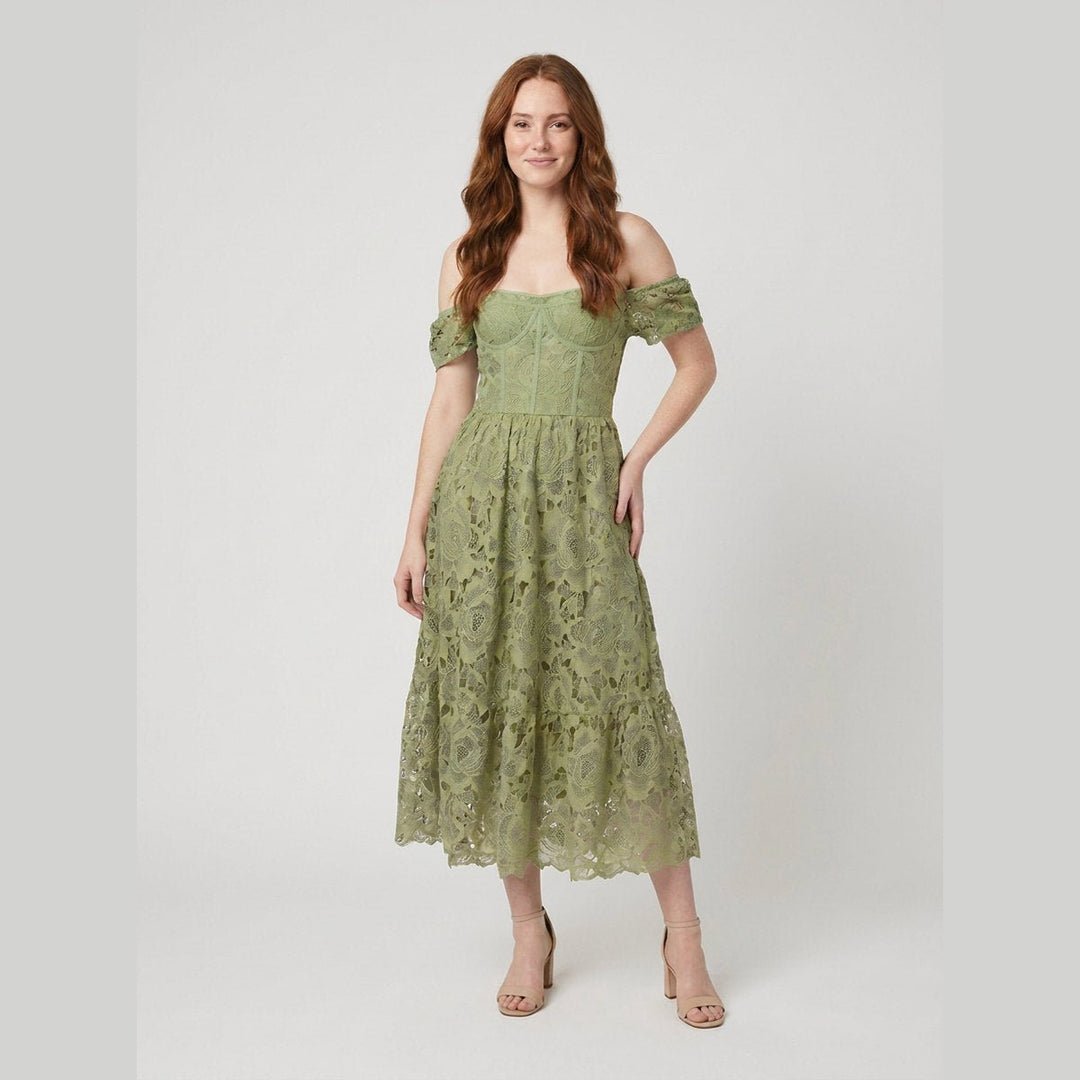 Salome off-shoulder floral midi dress in green, styled pose on model