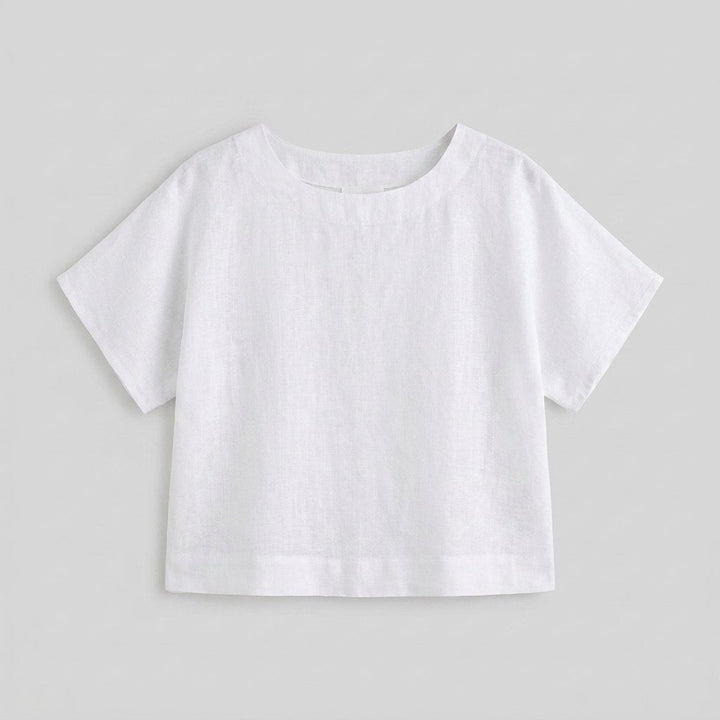 White loose-fit linen top, flat-lay