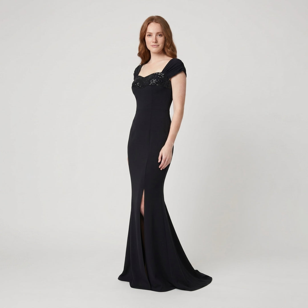 Sera black mermaid maxi evening gown side on model