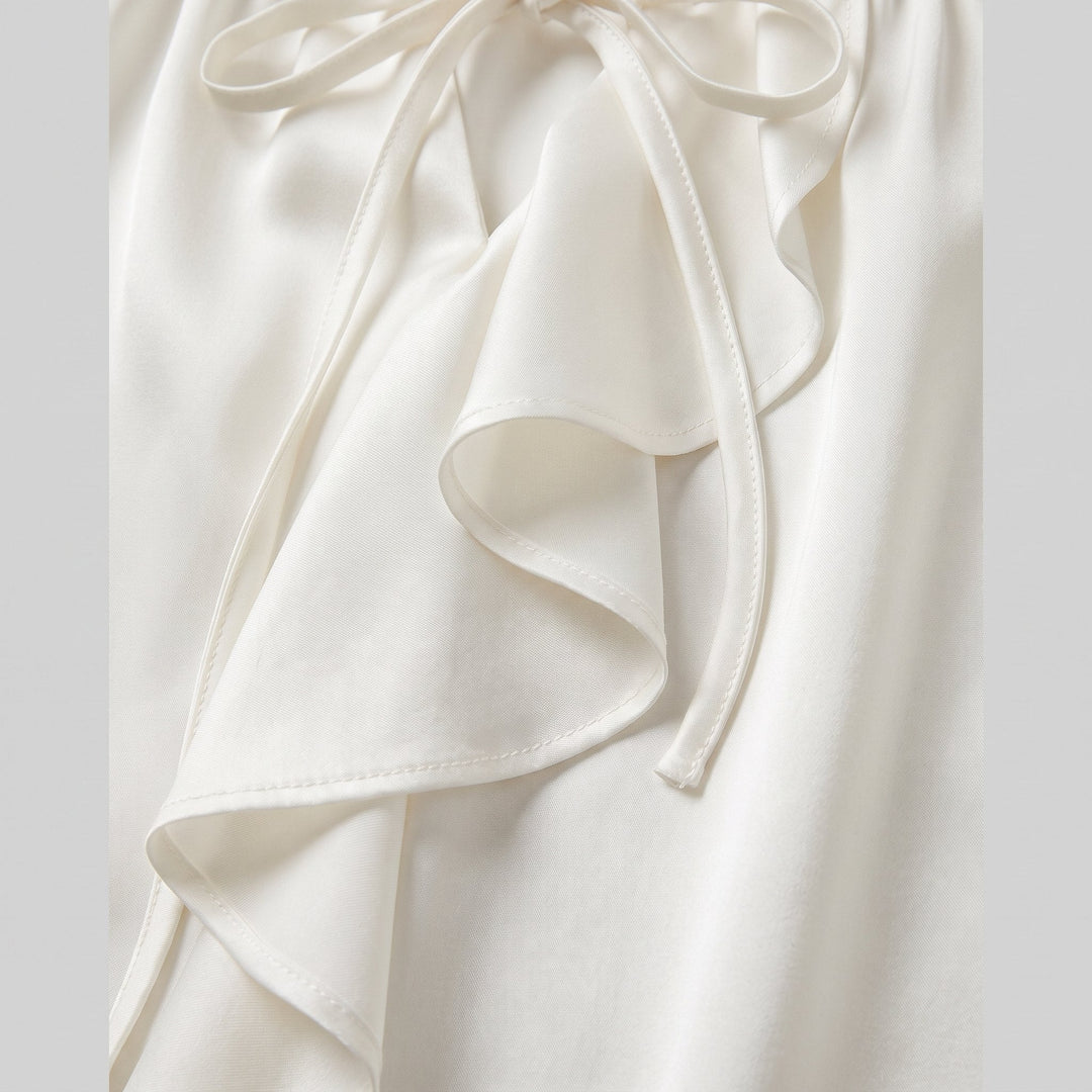 Severine blouse satin fabric and flounced ruffle trim close-up