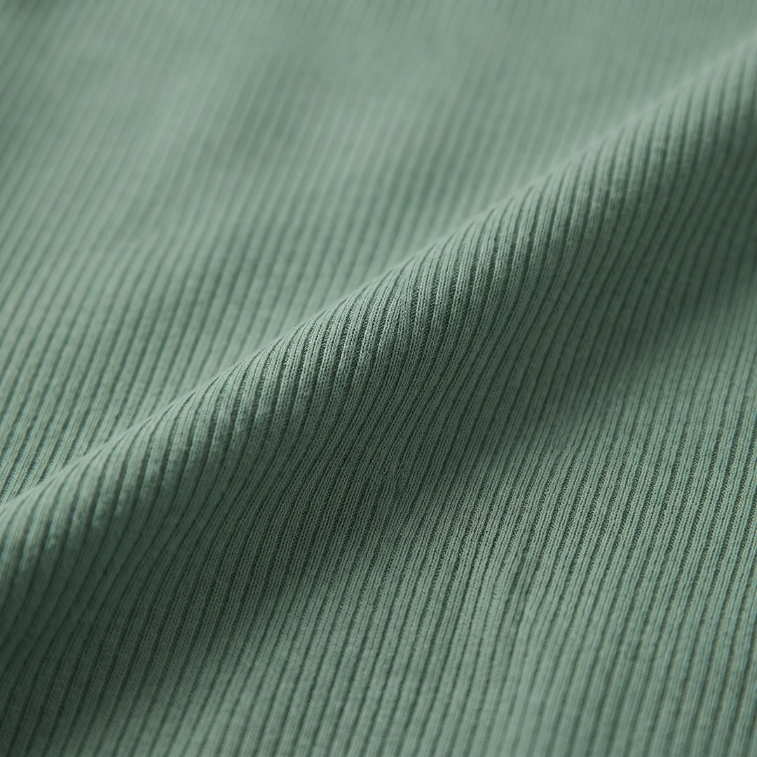 Close-up of the stretchy ribbed knit fabric - The store Vancouver
