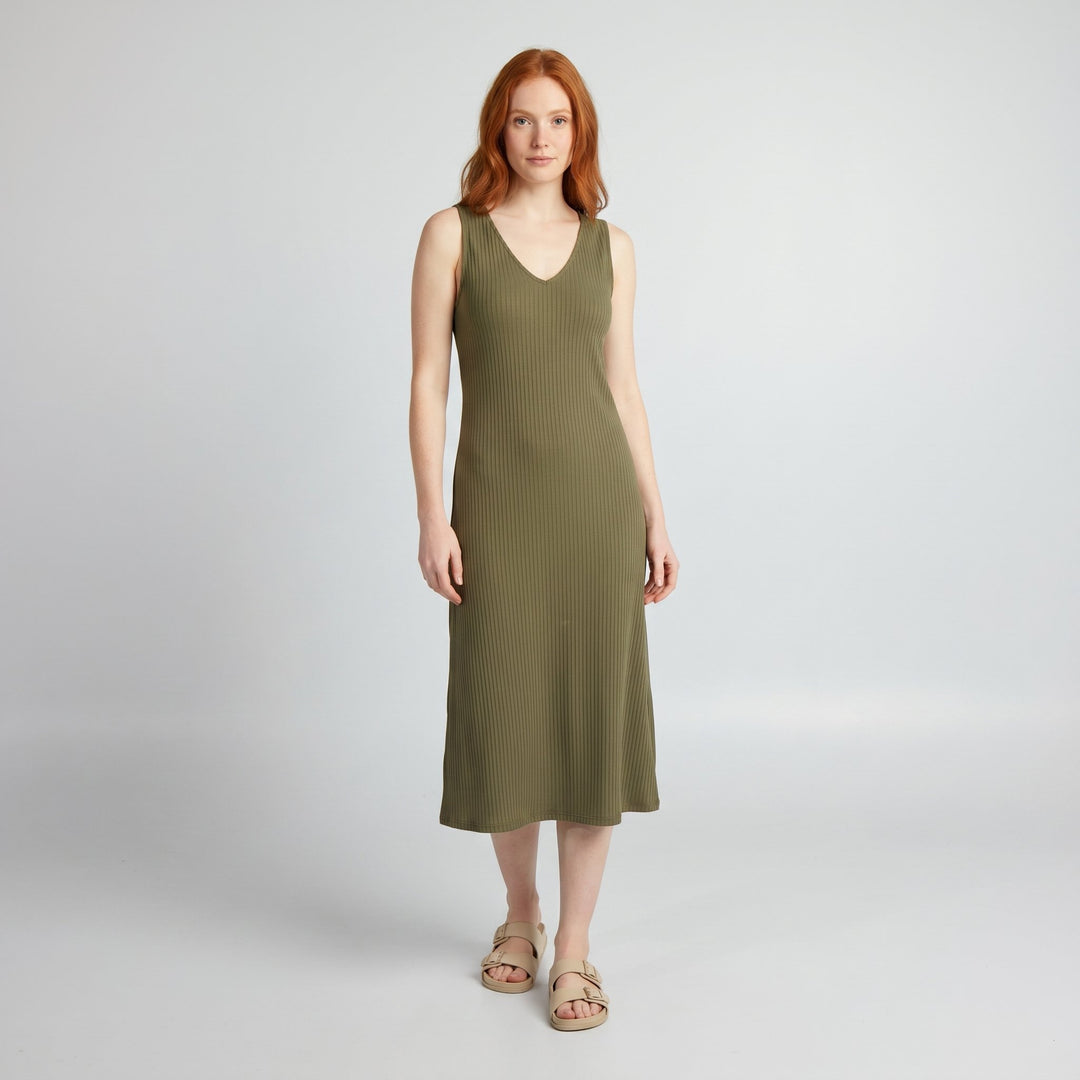 Svelte olive green deep V-neck ribbed bodycon midi dress on model