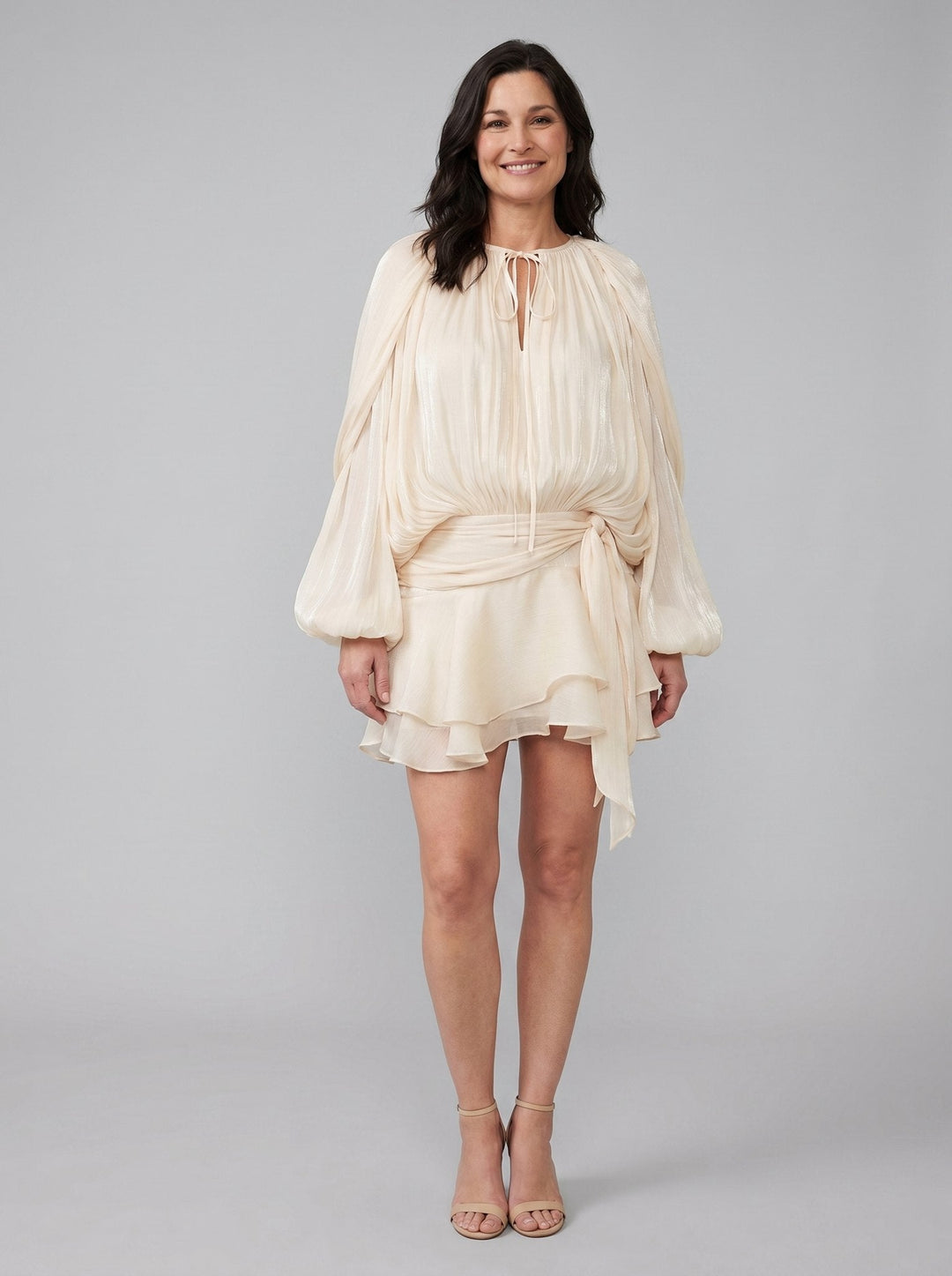 Sylvie pleated mini cocktail dress cream front on model