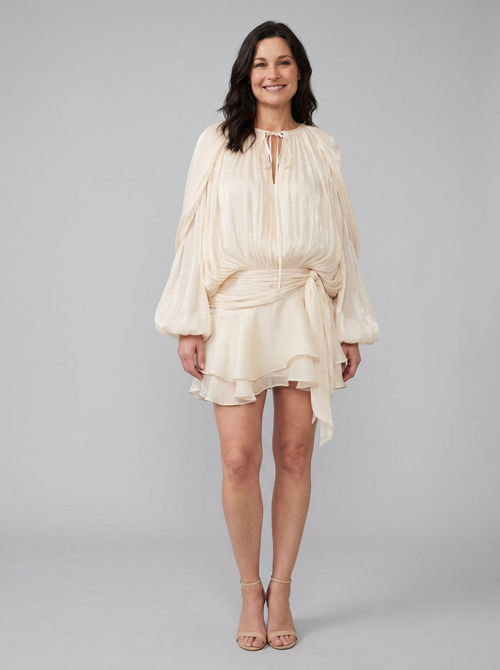 Sylvie pleated mini cocktail dress cream front on model
