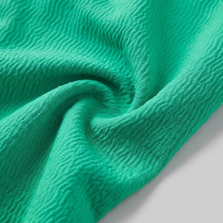 Talon swim trunks textured fabric close-up